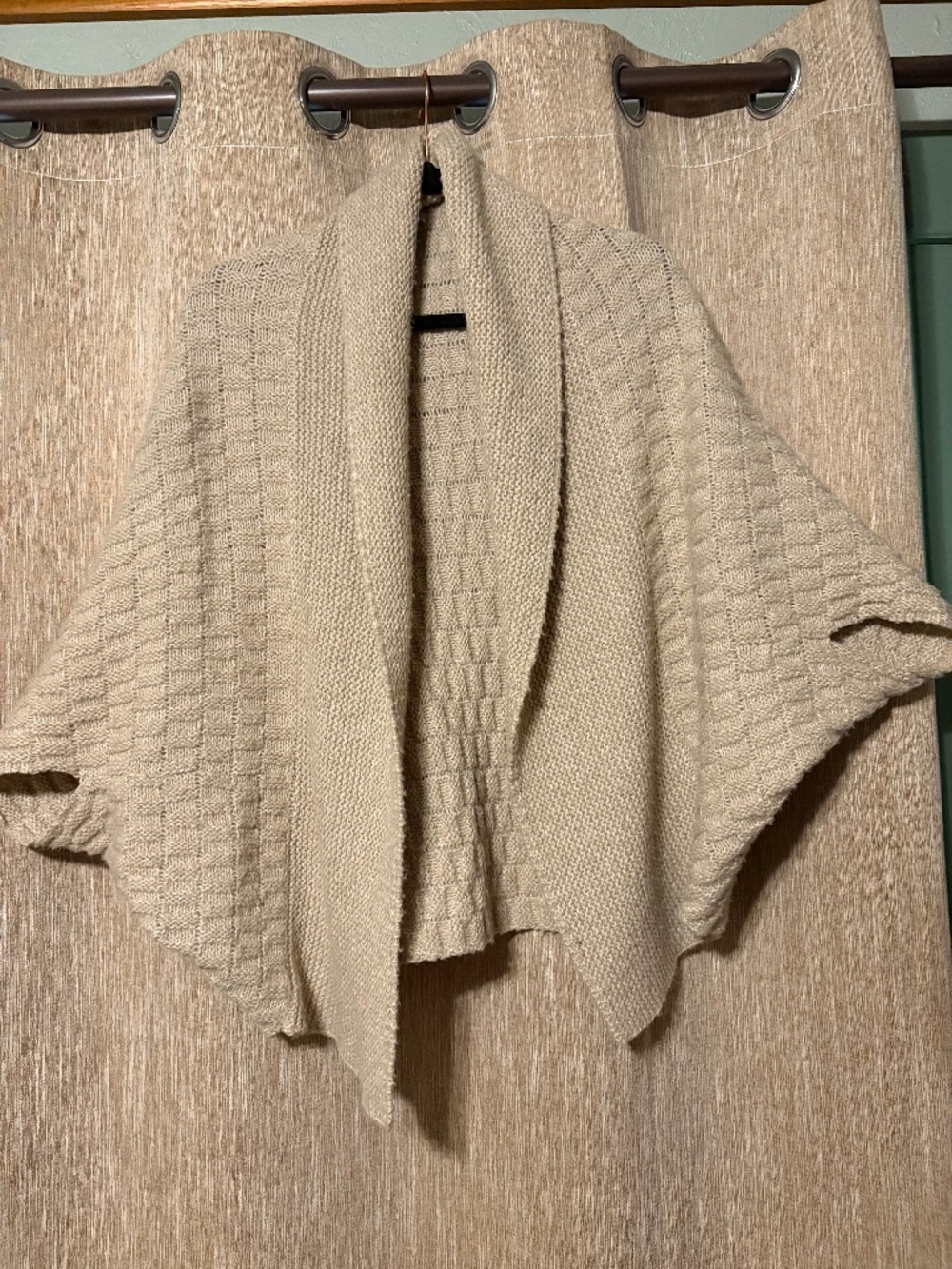 Jennifer Lopez sweater poncho